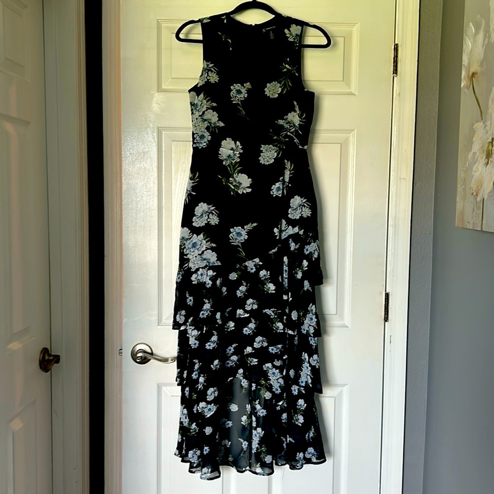 Beautifully layered ruffles in a floral pattern long dress by INC.